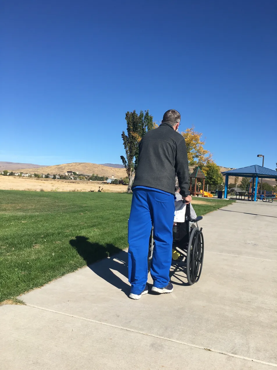 Resident enjoying an outdoor walk
